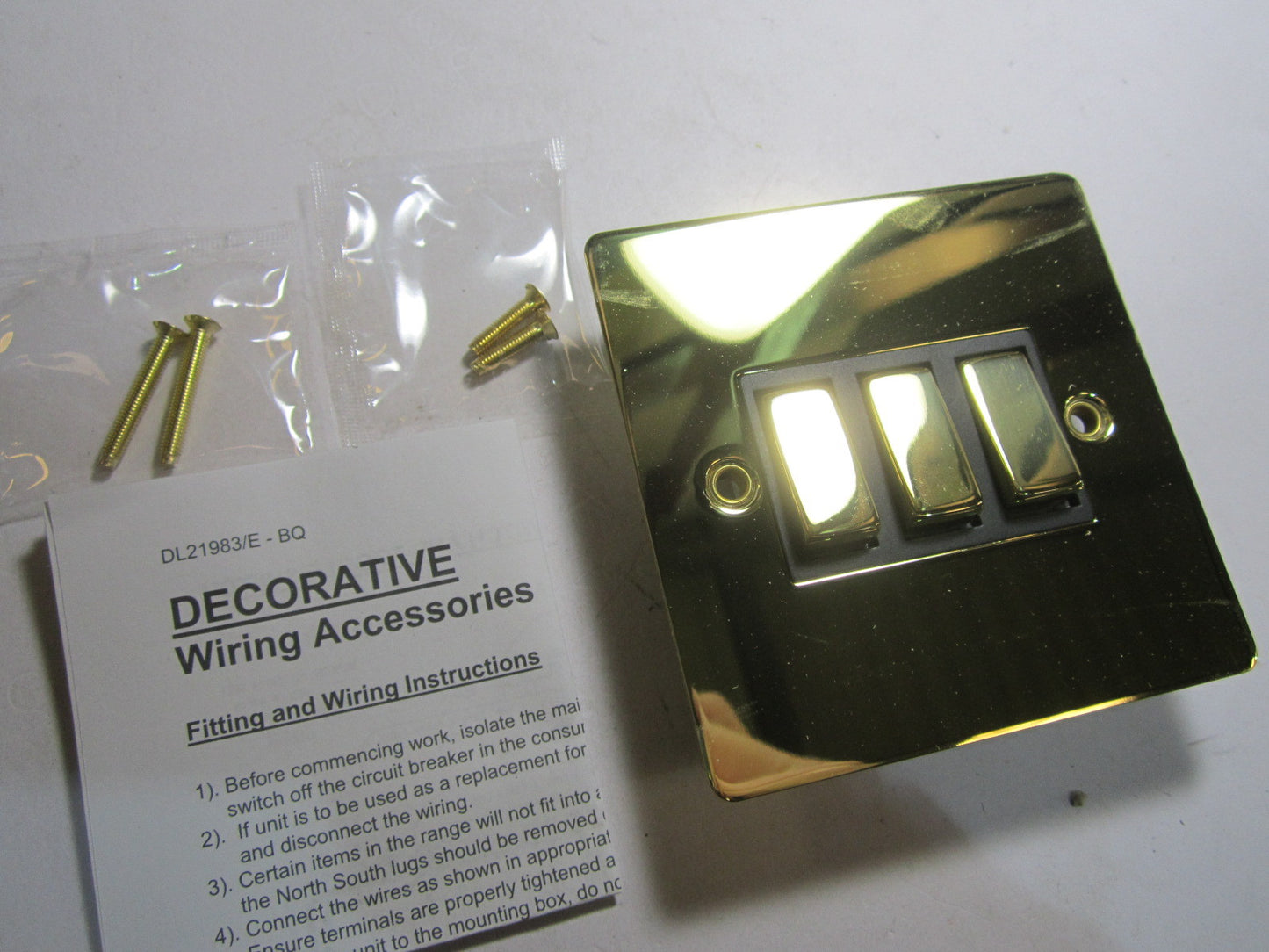 Volex 3 Gang 2 Way Lightswitch 10AX Black Interior Polished Brass Flat Plate
