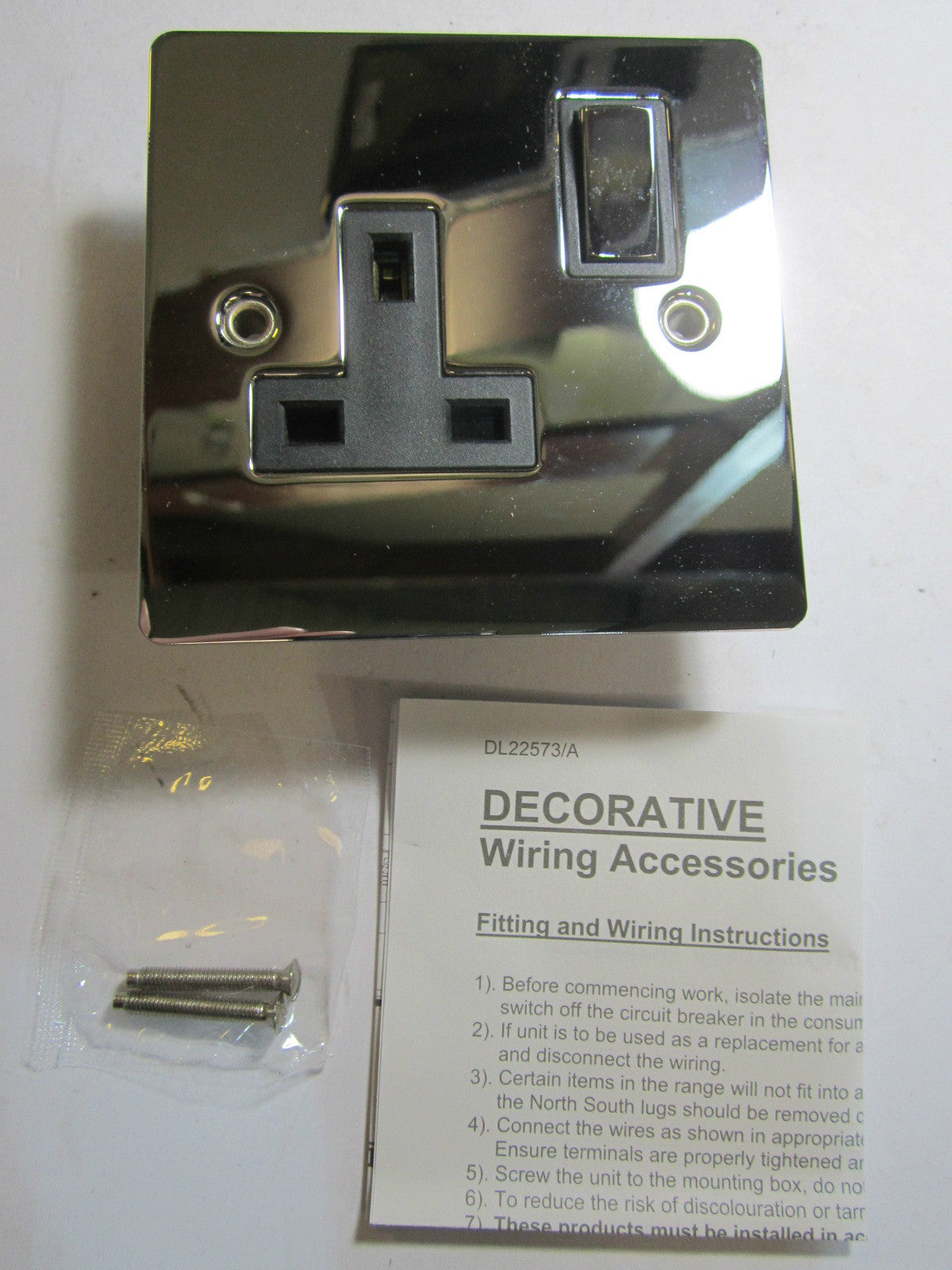 Volex 1 Gang Switched Socket 13A Double Pole Black Interior Polished Chrome Flat