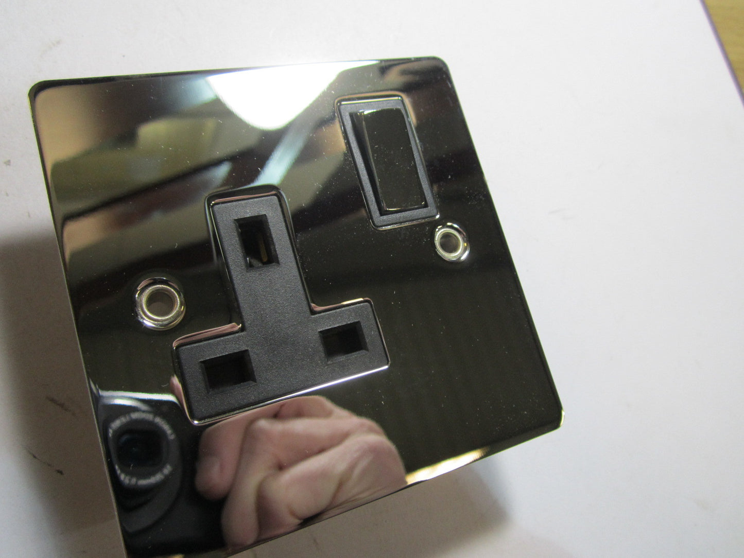 Volex 1 Gang Switched Socket 13A Double Pole Black Interior Polished Chrome Flat