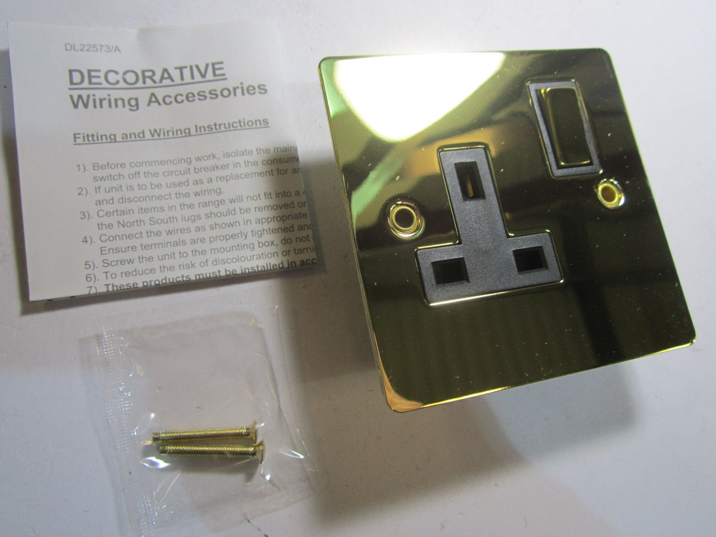 Volex 1 Gang Switched Socket 13A Double Pole Black Interior Polished Brass Flat