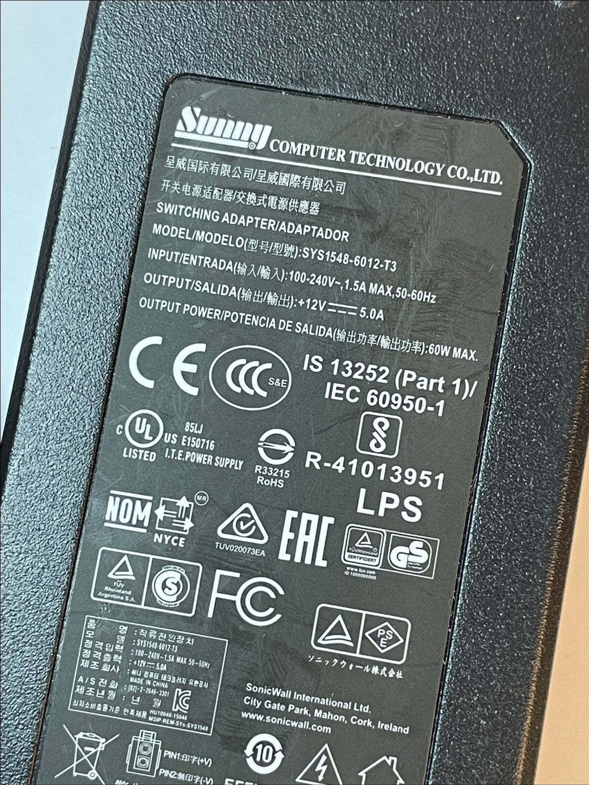 Sunny Switching Adapter model SYS1548-6012-T3 12V 5.0A for SonicWall Sonic Wall