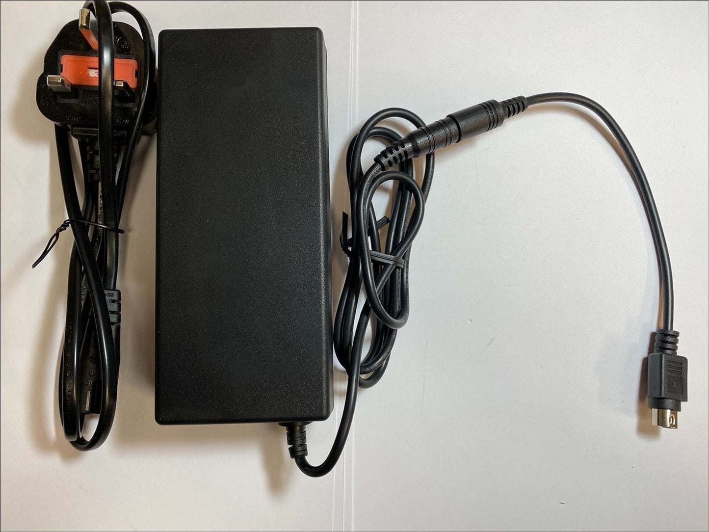 12V 7A Mains AC-DC Adaptor Power Supply with 4 Pin Din 2 Pins Left Positive + UK